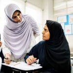 Cambridge-certified English teacher conducting a training session in Saudi Arabia classroom